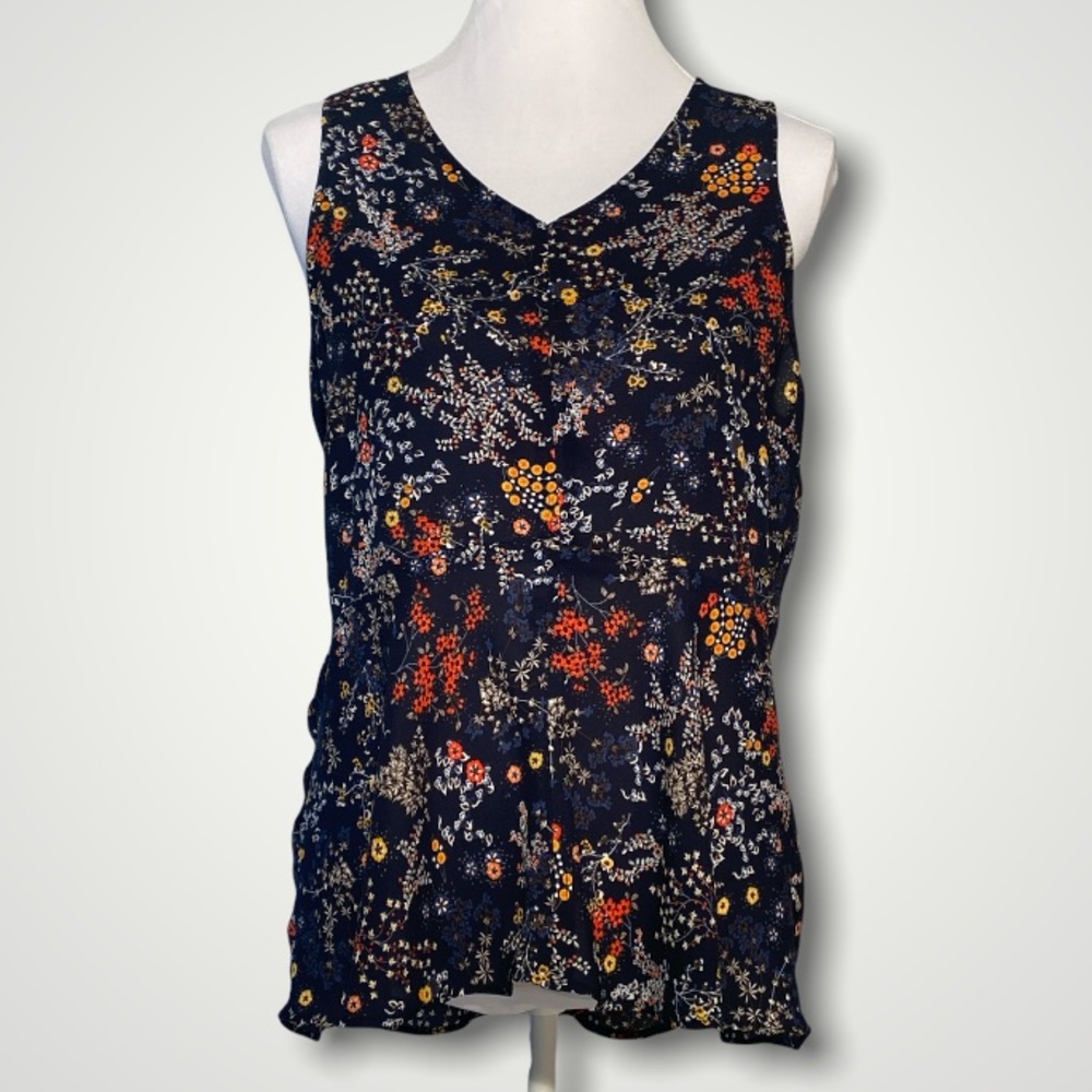 Emma & Olivia sleeveless peplum top. Size large.